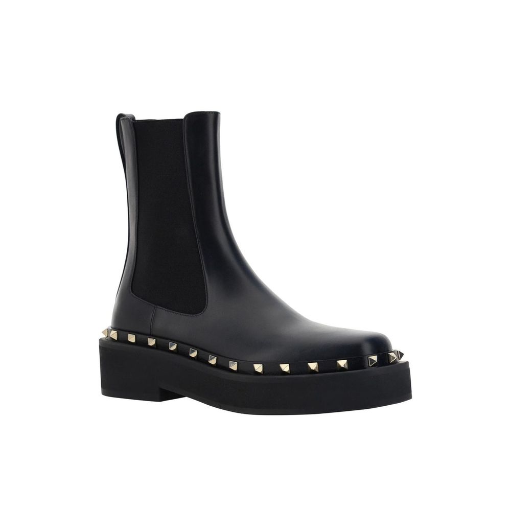 Botas planas Valentino Garavani de piel de becerro negras