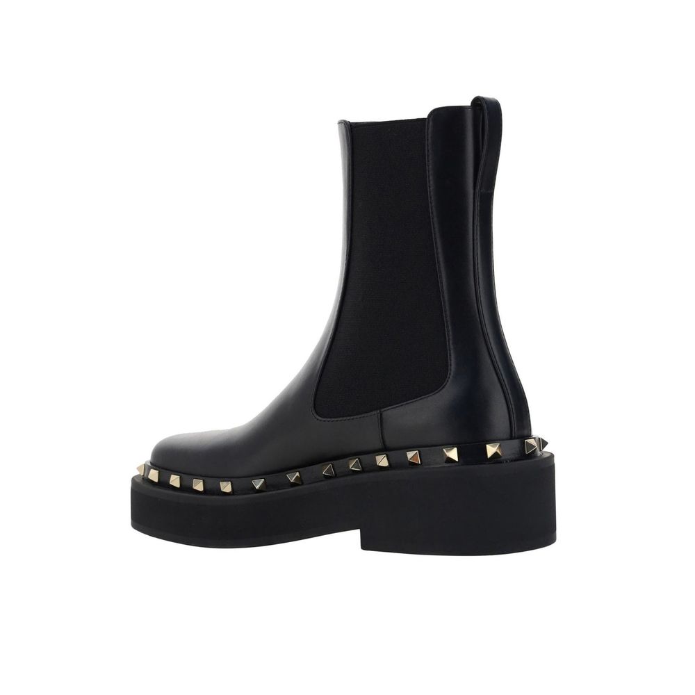 Botas planas Valentino Garavani de piel de becerro negras