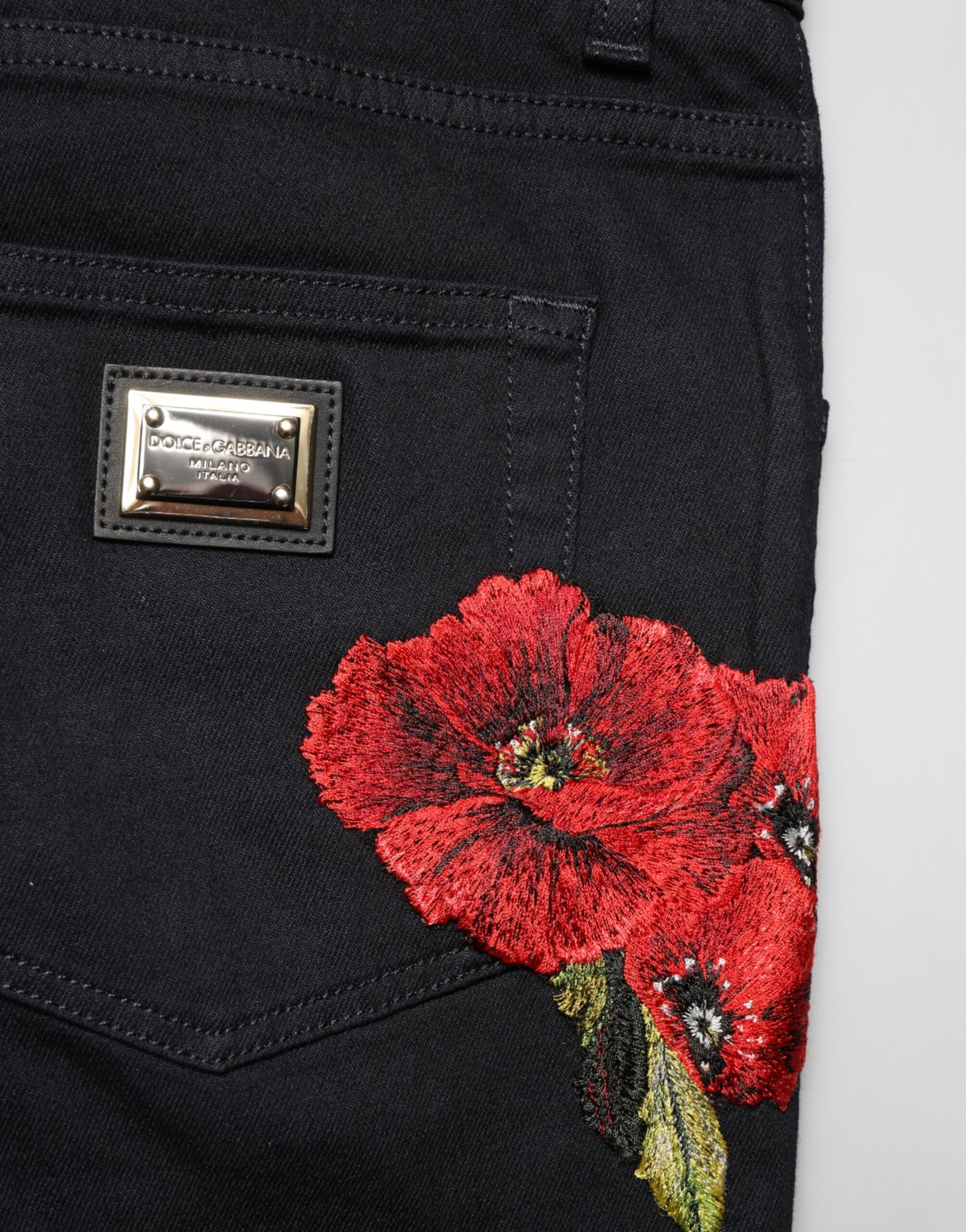 Dolce & Gabbana Vaqueros ajustados de hombre de algodón con estampado floral negros