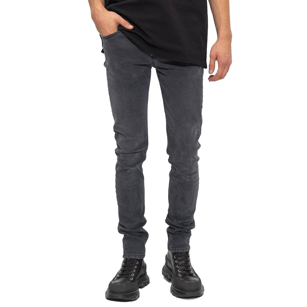Alexander McQueen Jeans ajustados de algodón negro
