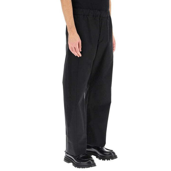 Alexander McQueen Pantalones casuales de algodón negros