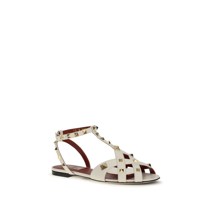 Sandales plates en cuir de chèvre beige Valentino Garavani