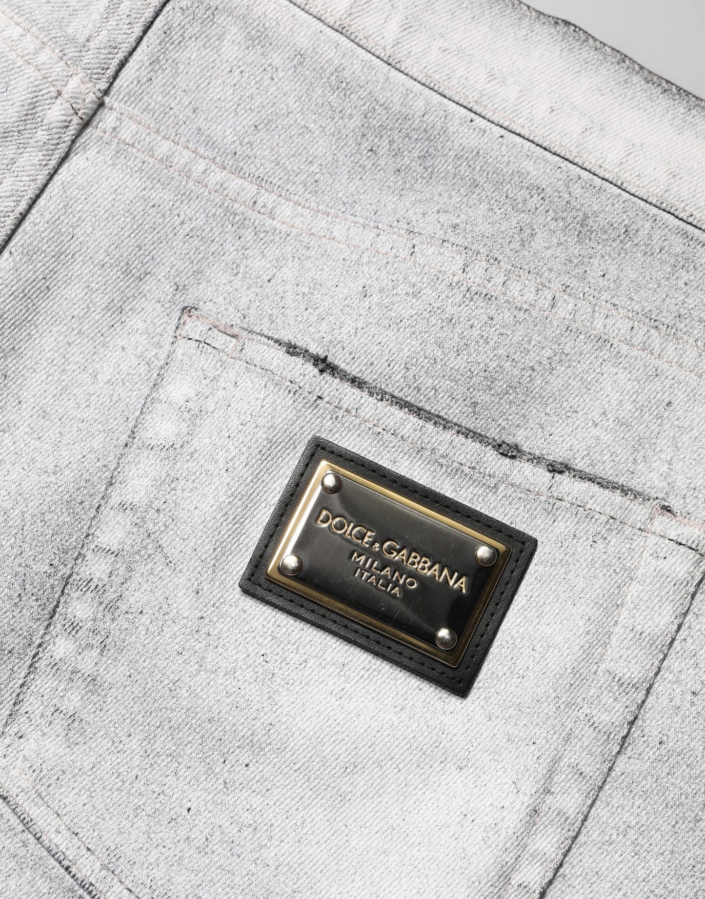 Jeans de mezclilla Dolce & Gabbana de hombre, ajustados, desgastados, gris claro