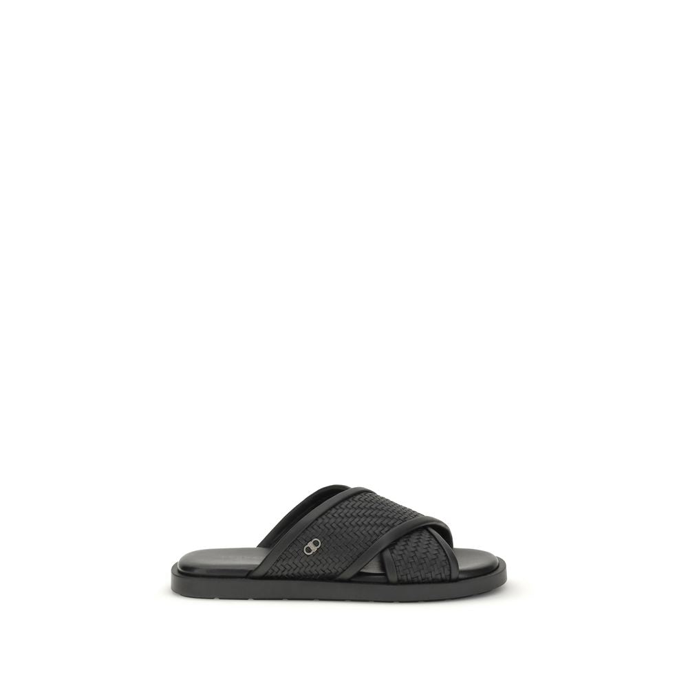 Sandalias planas Ferragamo de piel de becerro negra Bos Taurus