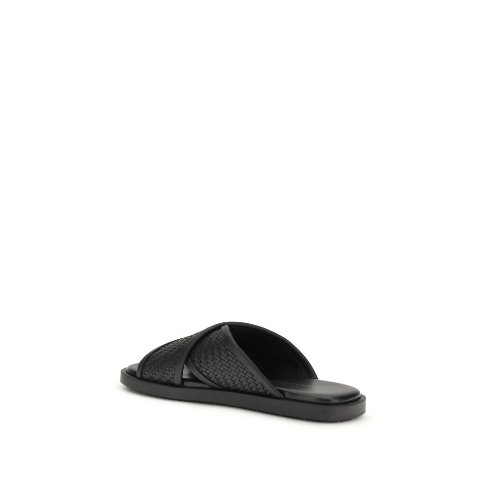 Sandalias planas Ferragamo de piel de becerro negra Bos Taurus