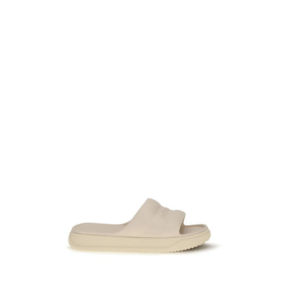 Mules Moncler en caoutchouc beige