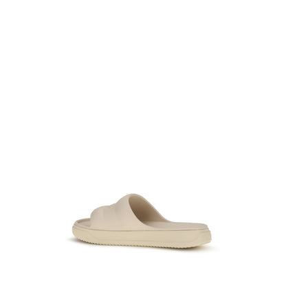 Mules Moncler en caoutchouc beige