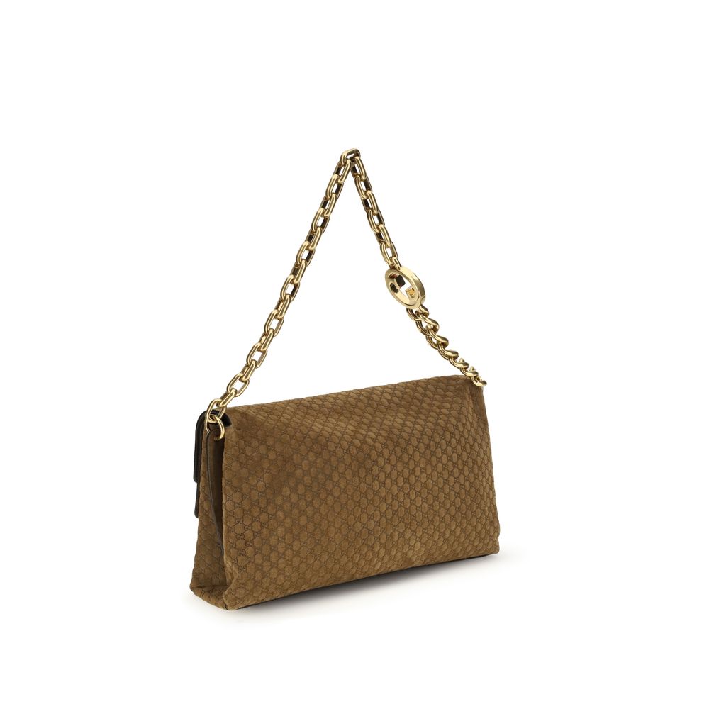 Sac à main Gucci en cuir suédé marron