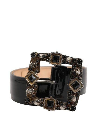 Cinturón Dolce & Gabbana de piel negra con hebilla de metal y cristal