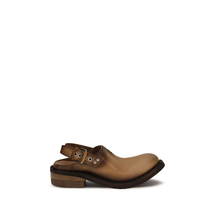 Mules Miu Miu de piel de becerro marrón Bos Taurus