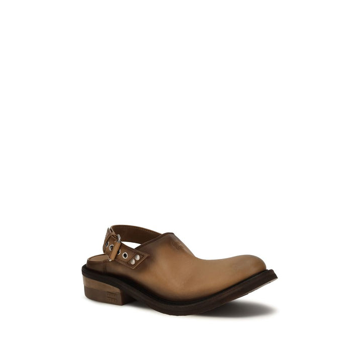 Mules Miu Miu de piel de becerro marrón Bos Taurus