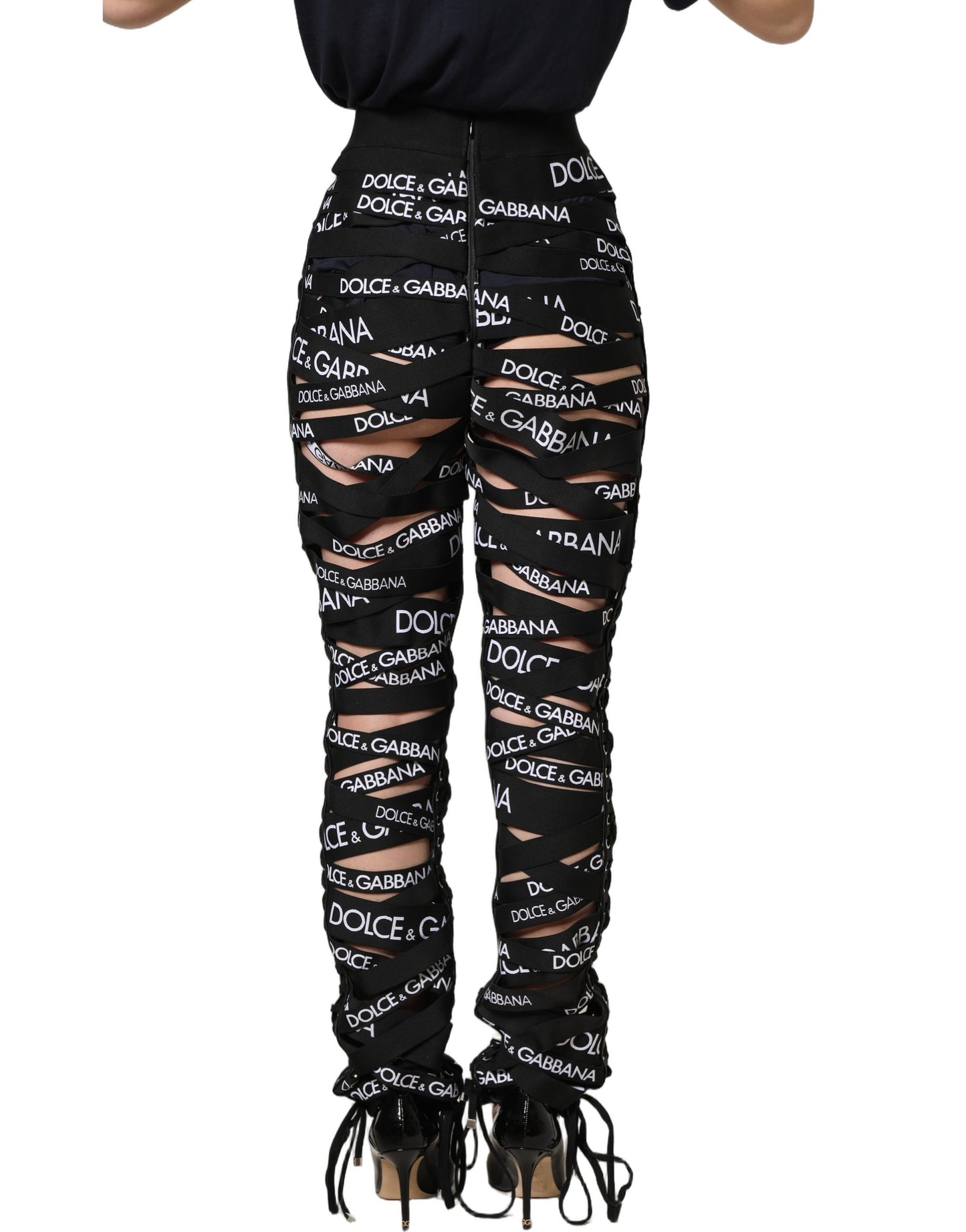 Pantalon Dolce & Gabbana taille haute skinny noir avec découpes et logo en ruban
