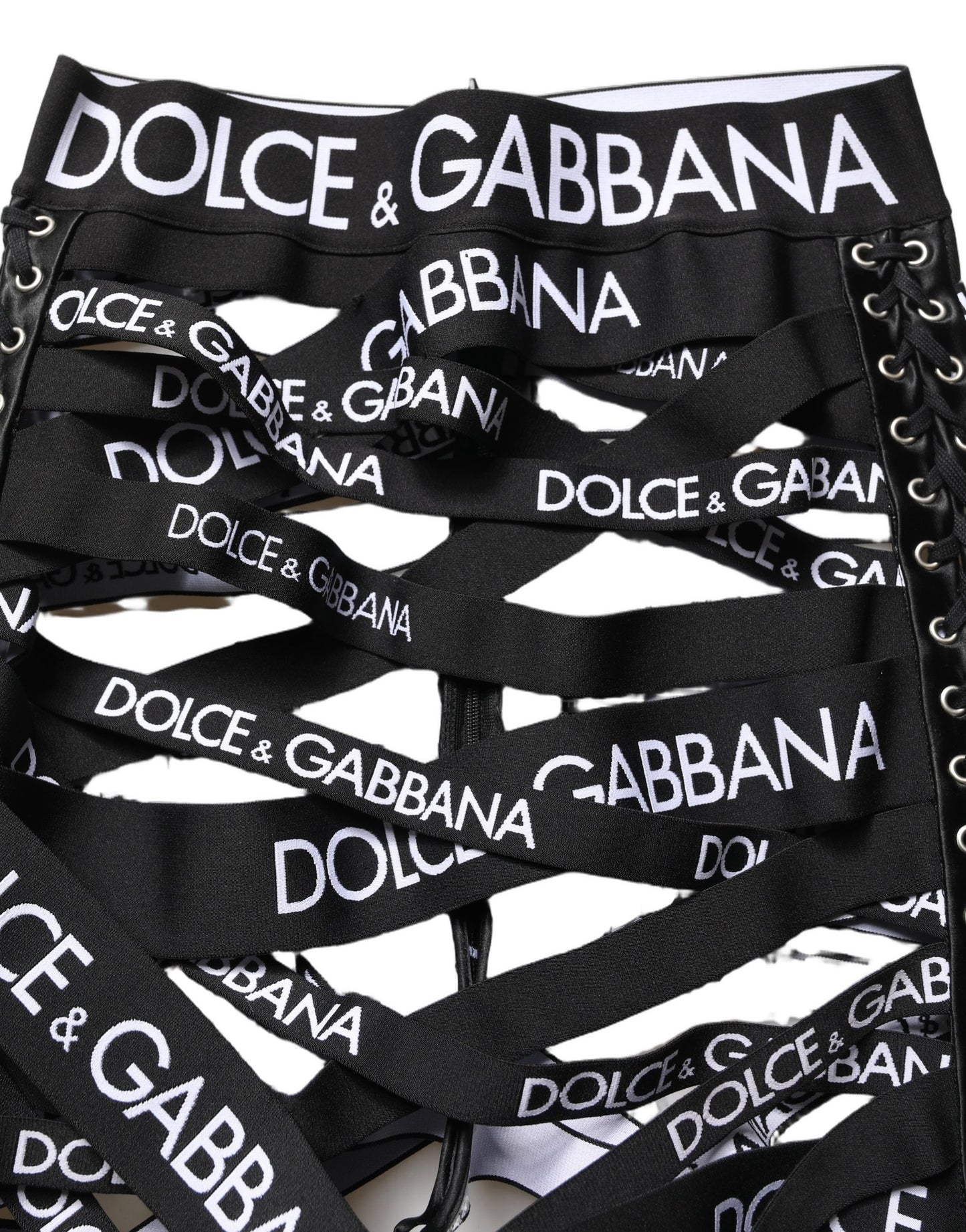 Pantalon Dolce & Gabbana taille haute skinny noir avec découpes et logo en ruban
