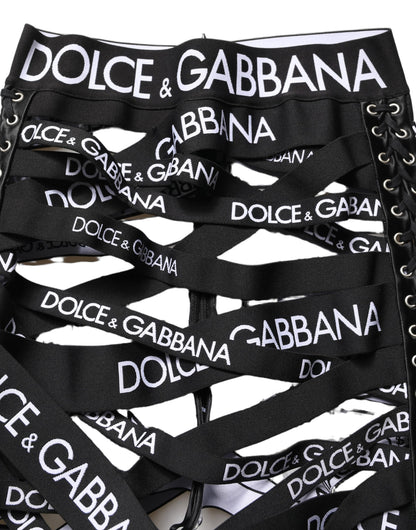 Pantalon Dolce & Gabbana taille haute skinny noir avec découpes et logo en ruban