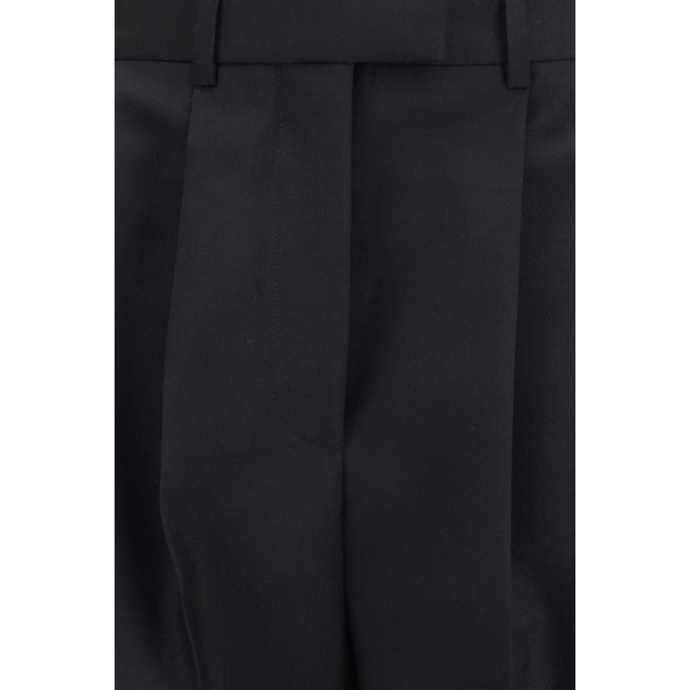 Pantalones de vestir Givenchy Oves Aries de lana negra