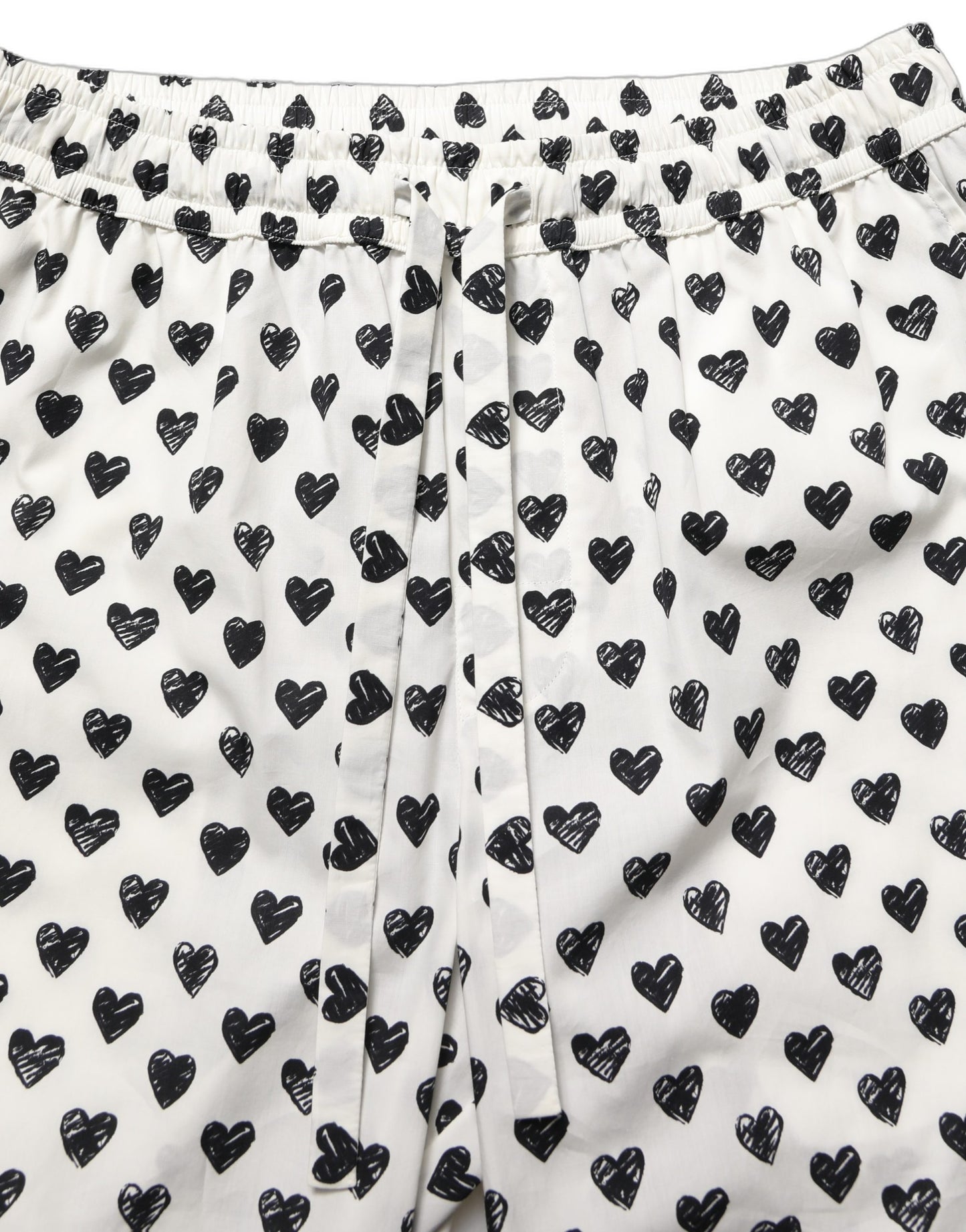 Dolce & Gabbana Pantalones de Hombre Blancos con Estampado Gráfico de Corazones