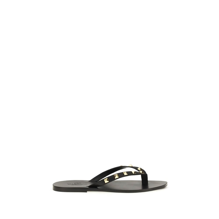 Valentino Garavani Sandales tongs en cuir de veau noir Bos Taurus