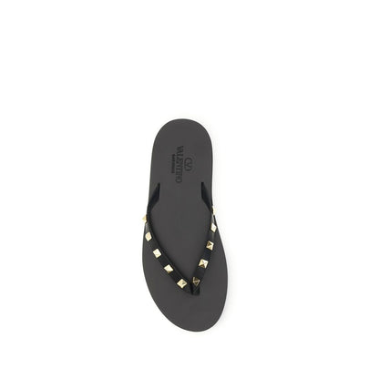Sandalias con chanclas Valentino Garavani de piel de becerro negra Bos Taurus