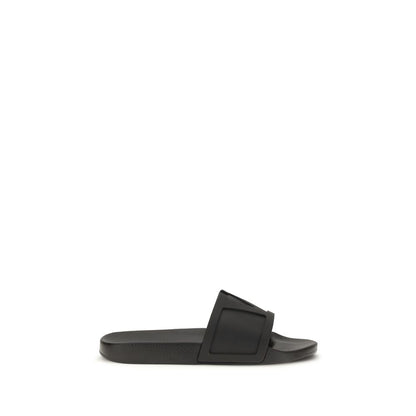 Sandalias planas de goma negras Valentino Garavani