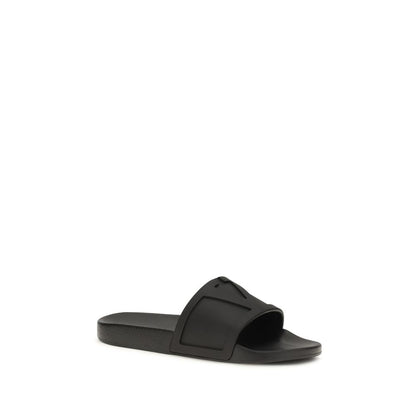 Sandalias planas de goma negras Valentino Garavani