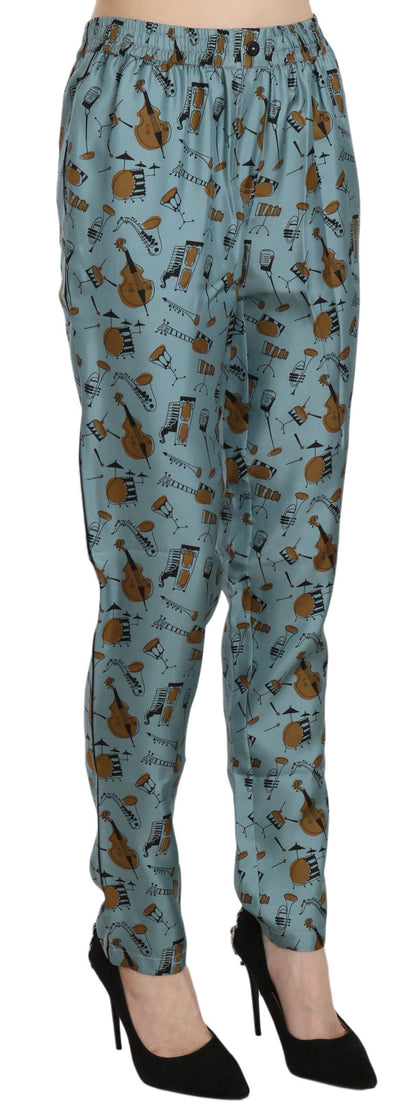 Pantalones pitillo estampados con instrumentos musicales azules de Dolce & Gabbana