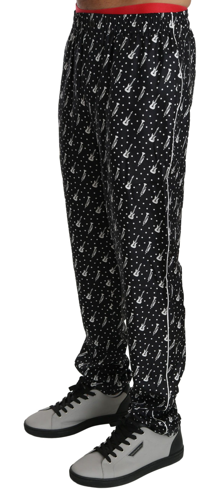 Pantalones de seda negros con estampado de instrumentos musicales de Dolce & Gabbana