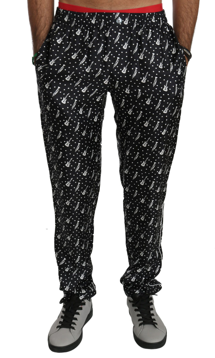 Pantalones de seda negros con estampado de instrumentos musicales de Dolce & Gabbana