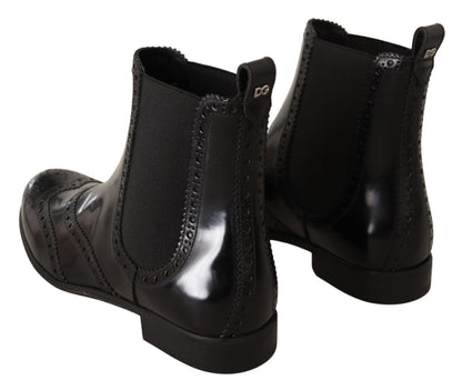 Chaussures bottes plates montantes Dolce & Gabbana en cuir noir