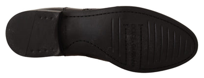 Chaussures bottes plates montantes Dolce & Gabbana en cuir noir
