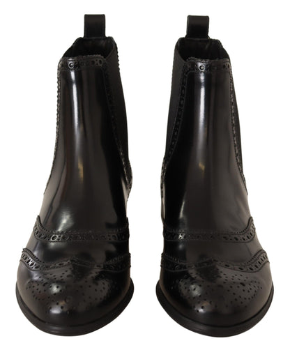 Chaussures bottes plates montantes Dolce & Gabbana en cuir noir