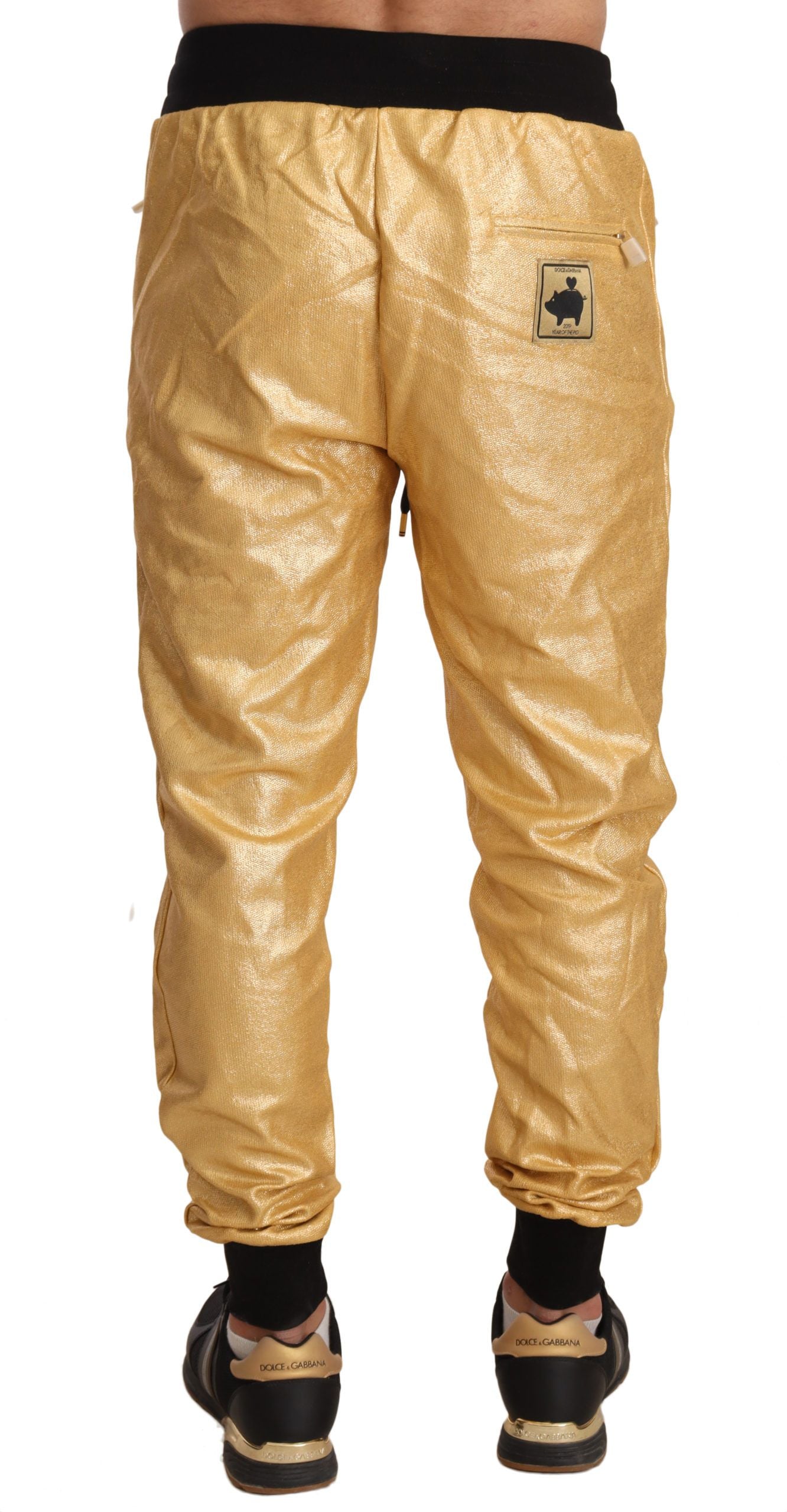 Pantalon en coton Dolce & Gabbana motif cochon doré de l'année