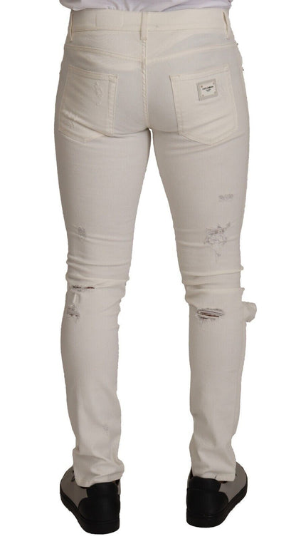 Jean skinny en denim de coton déchiré blanc Dolce & Gabbana pour homme