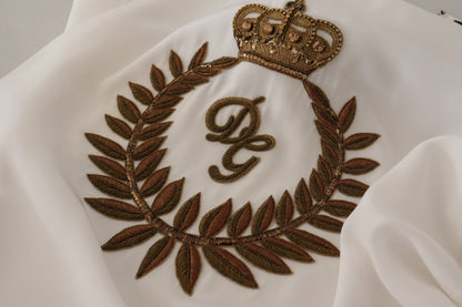 Chemisier Dolce & Gabbana en soie blanche avec cristaux DG dorés