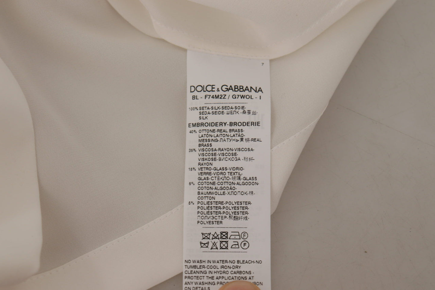 Chemisier Dolce & Gabbana en soie blanche avec cristaux DG dorés