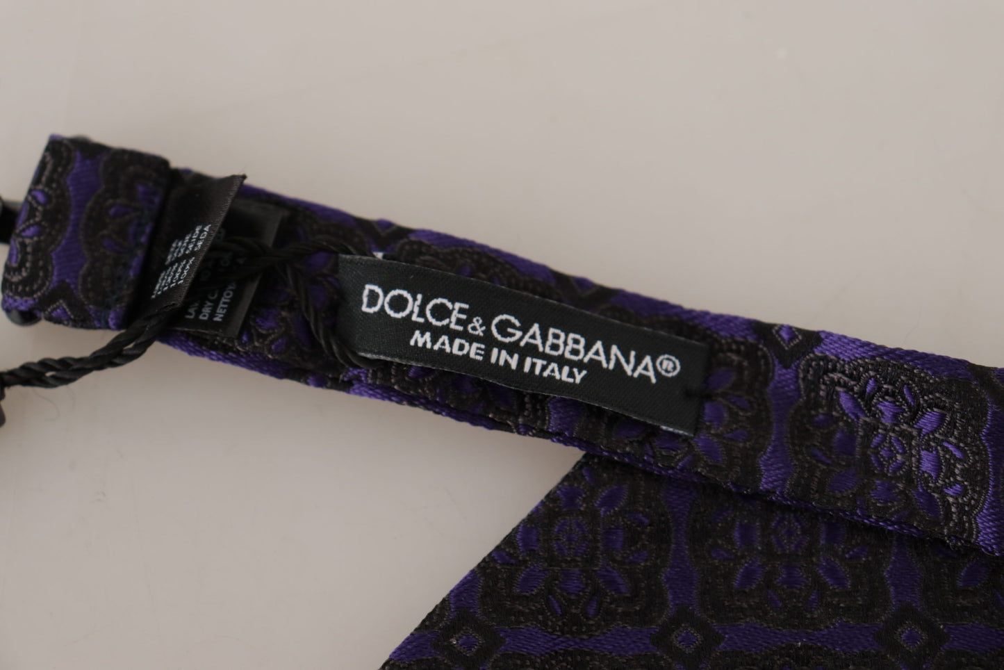 Pajarita ajustable de seda azul con motivos geométricos de Dolce & Gabbana