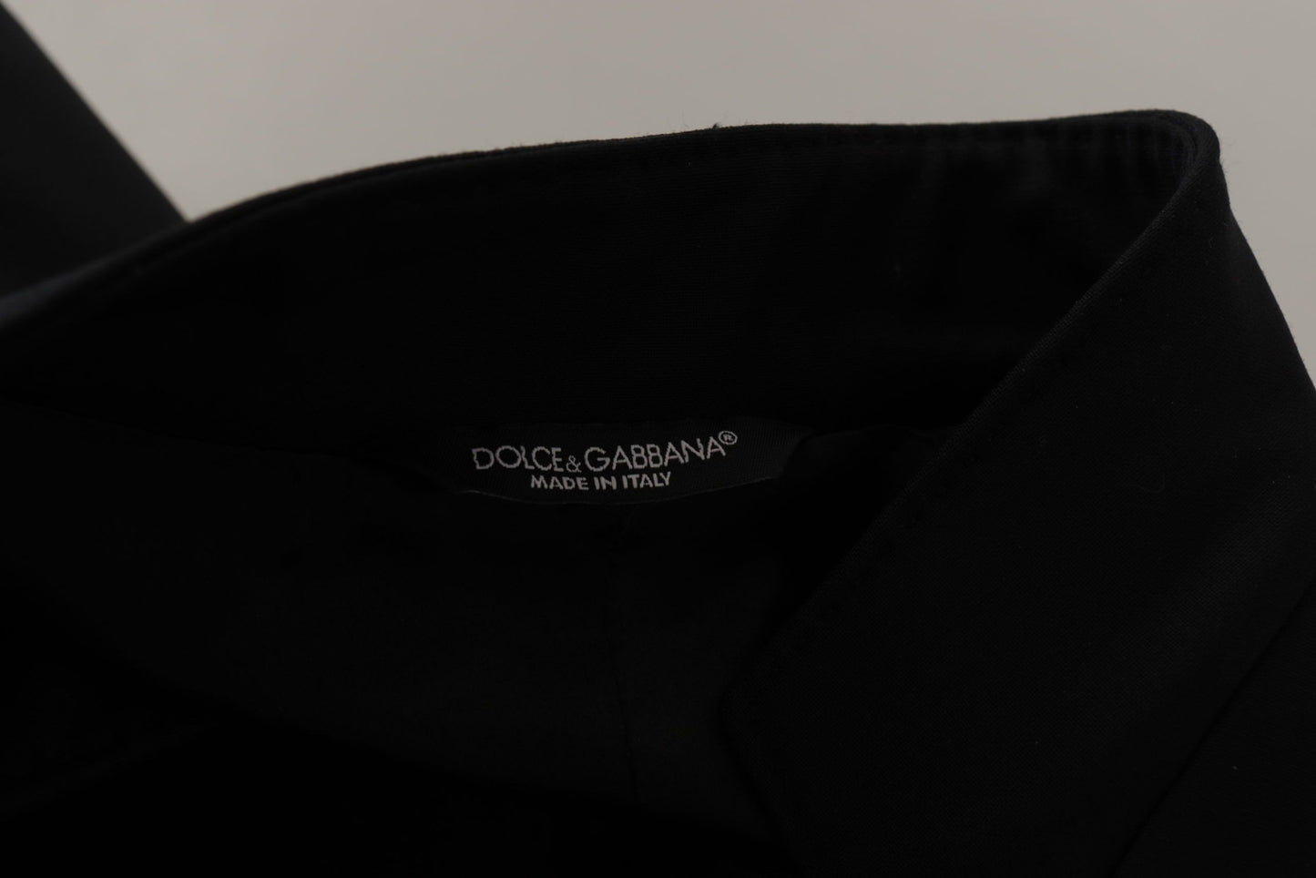 Dolce & Gabbana Manteau en laine noire à simple boutonnage pour homme