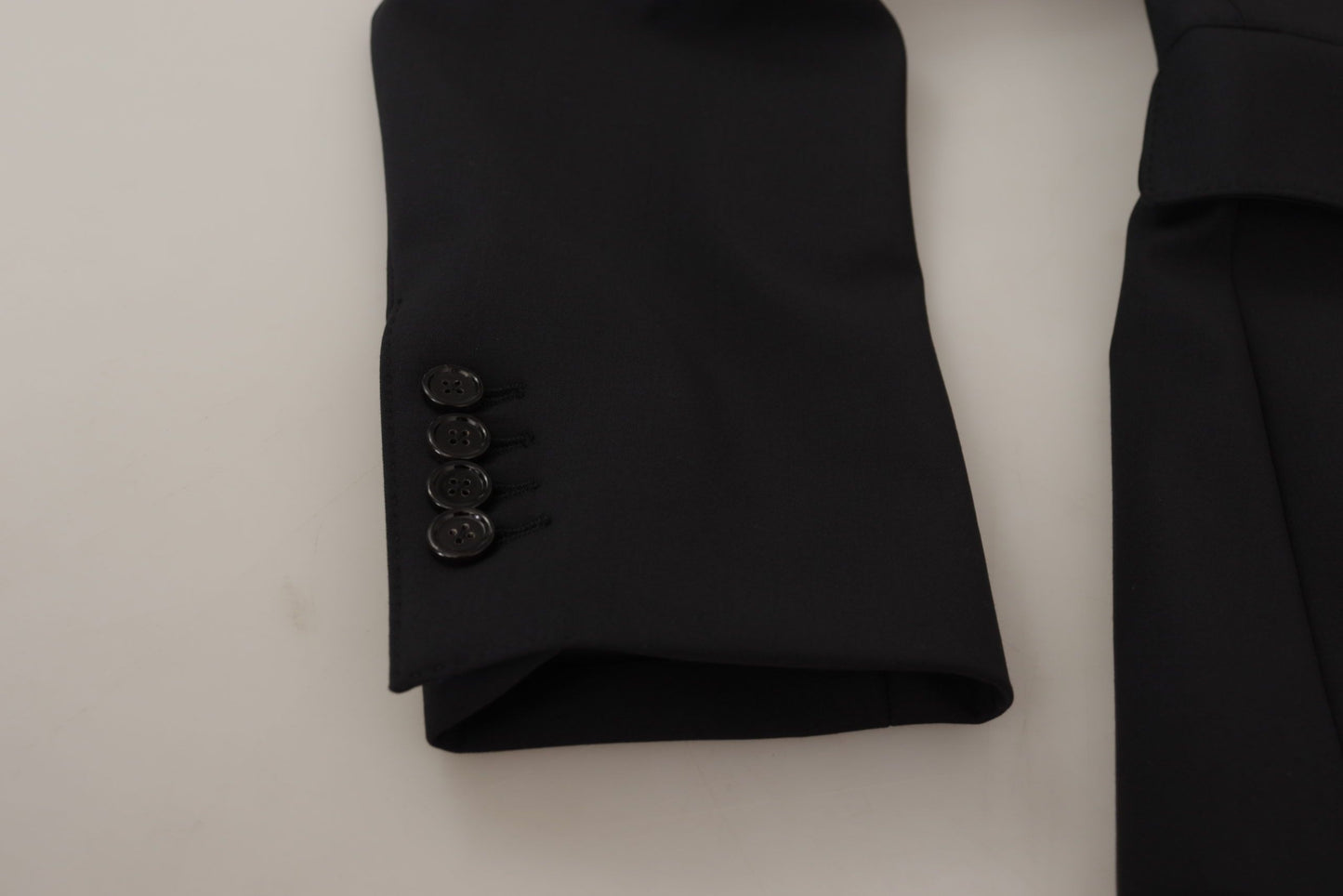 Dolce & Gabbana Manteau en laine noire à simple boutonnage pour homme
