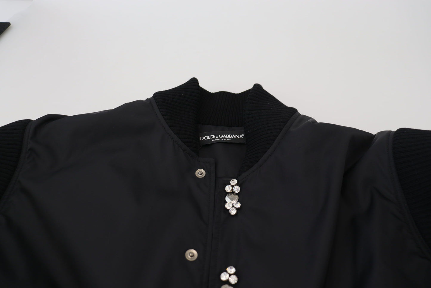 Dolce & Gabbana Chaqueta de nailon negro con botones de cristales