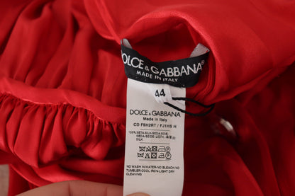Robe mi-longue en satin de soie rouge Dolce & Gabbana boutonnée à ceinture