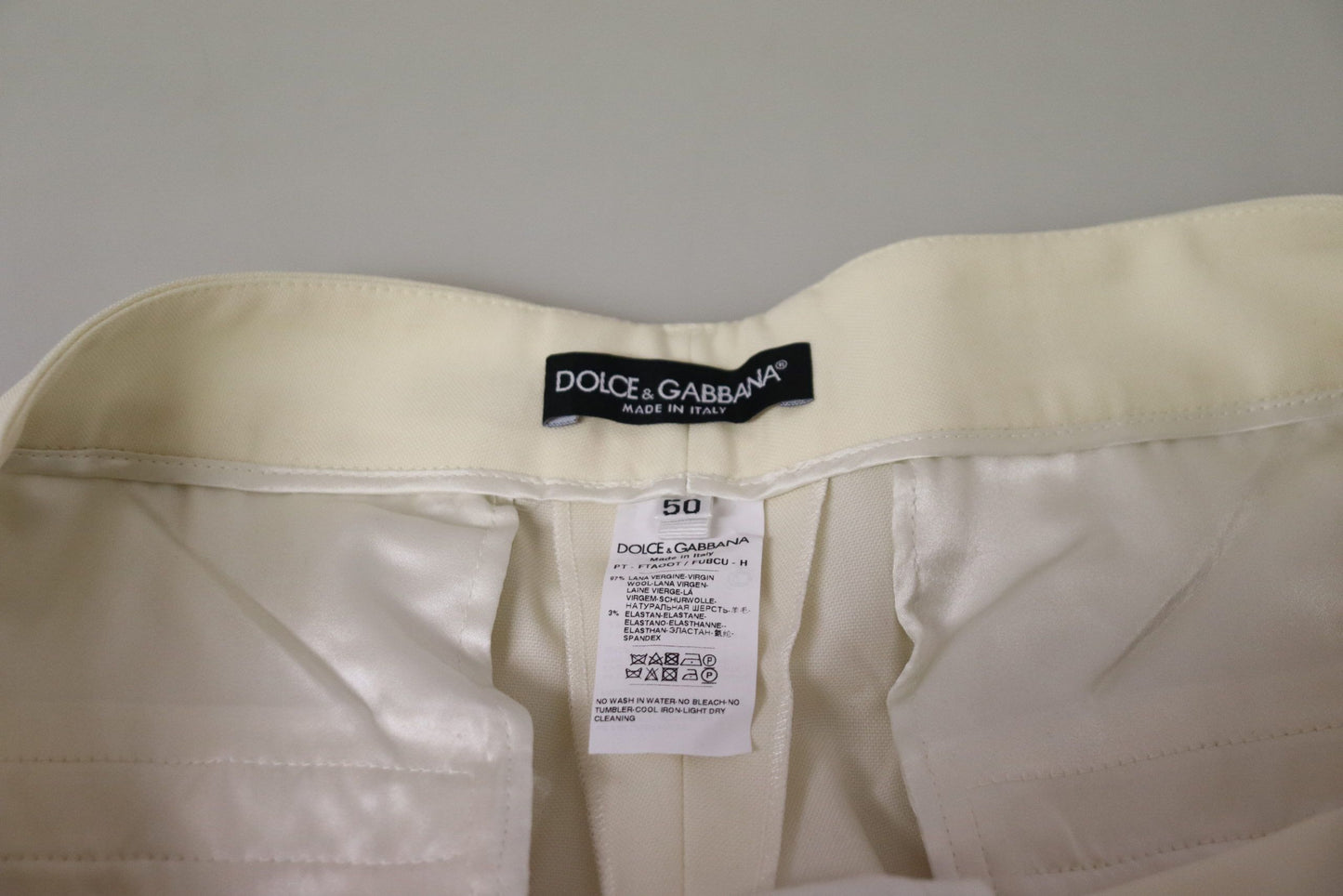 Pantalon taille haute écourté avec ourlet replié en ivoire Dolce & Gabbana