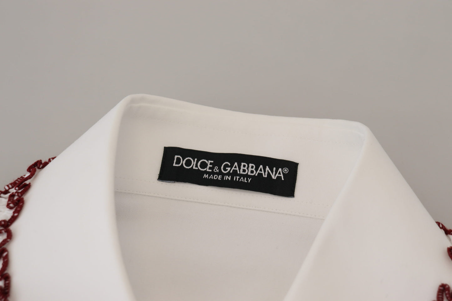 Haut à col volanté et manches longues en dentelle blanche Dolce & Gabbana