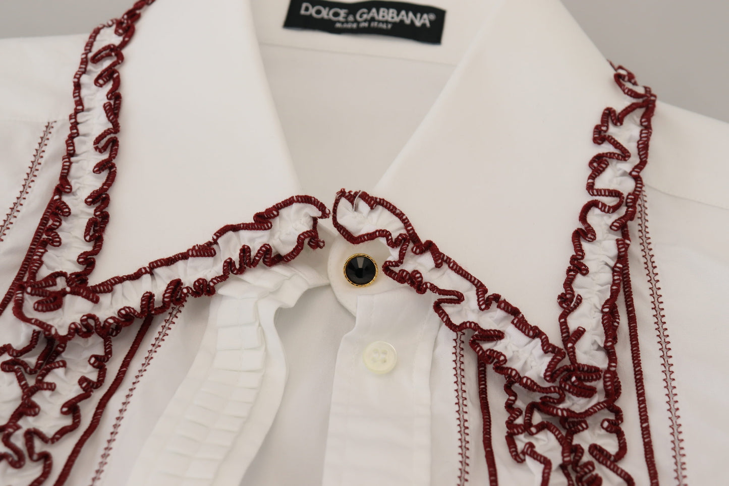 Haut à col volanté et manches longues en dentelle blanche Dolce & Gabbana