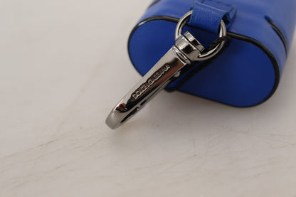 Étui Airpods Dolce & Gabbana en cuir bleu et logo en métal argenté