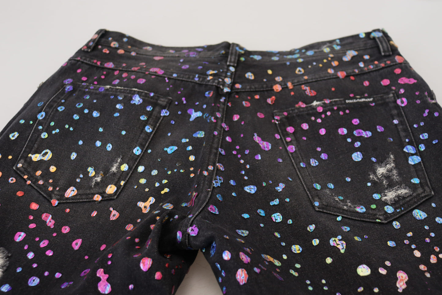 Jean en denim effiloché à imprimé multicolore Dolce & Gabbana noir