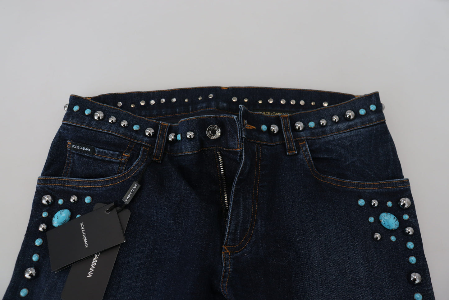 Jean en denim taille basse clouté en coton bleu Dolce & Gabbana