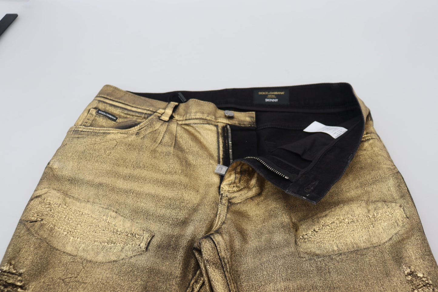 Jean slim effiloché en denim de coton doré Dolce & Gabbana pour homme