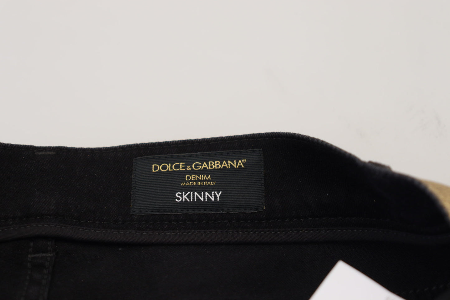 Jean slim effiloché en denim de coton doré Dolce & Gabbana pour homme