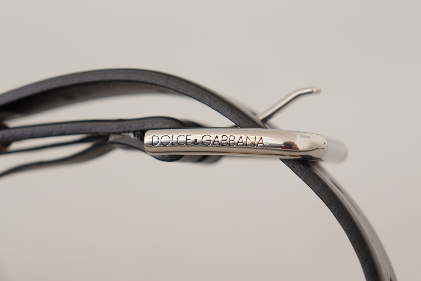 Ceinture Dolce & Gabbana en cuir noir avec œillets et boucle en métal argenté