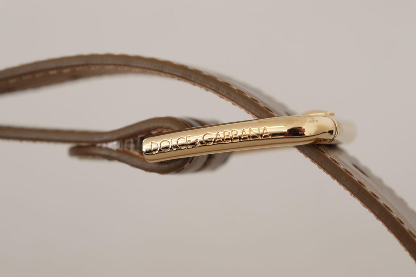 Ceinture Dolce & Gabbana en cuir bronze avec boucle gravée du logo doré