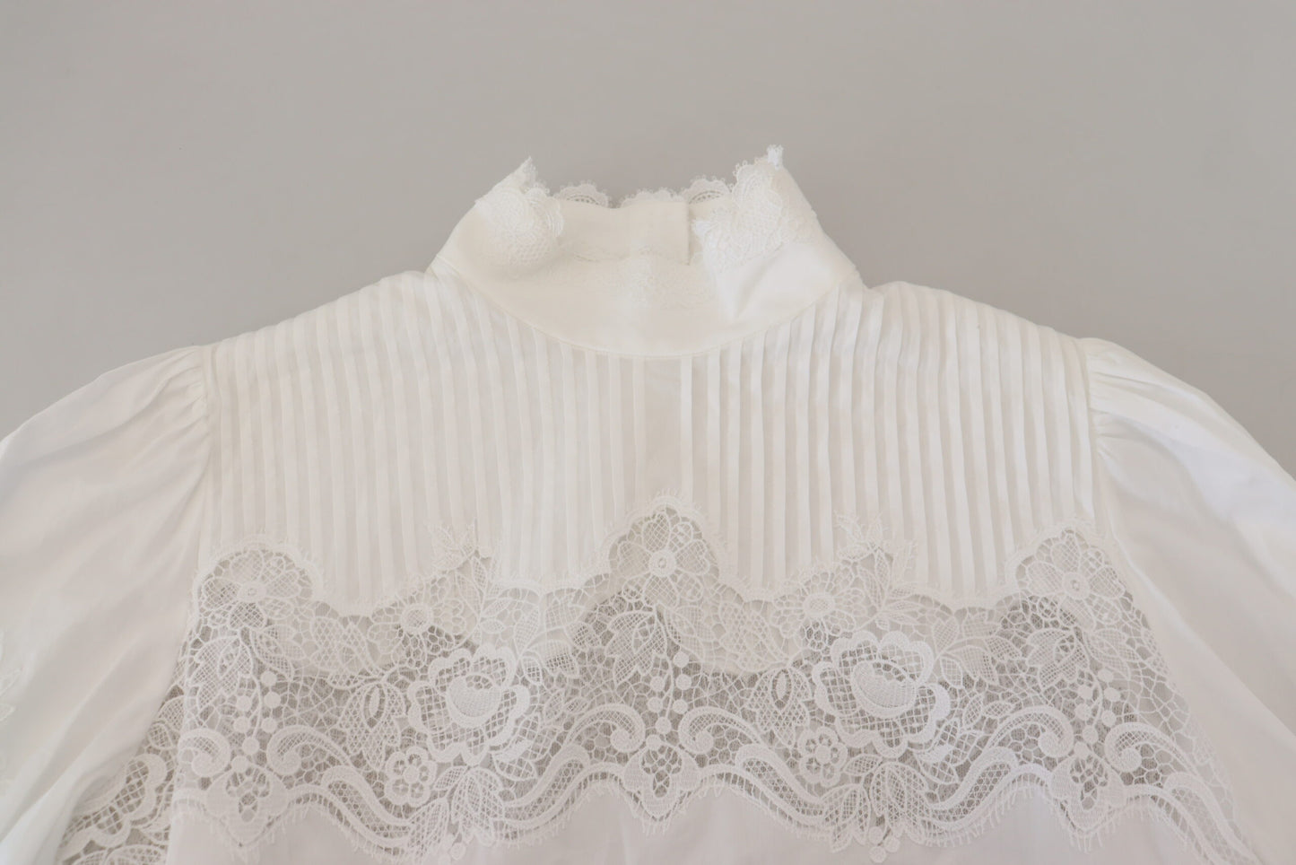 Haut à col roulé Dolce & Gabbana en coton blanc orné de dentelle